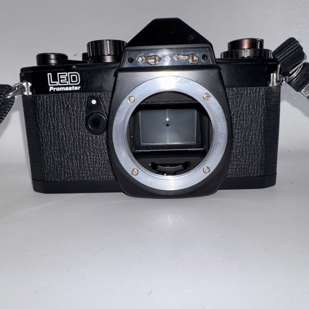 Chinon LED Promaster 35mm SLR Film Camera with Two Lenses and A Flash Untested